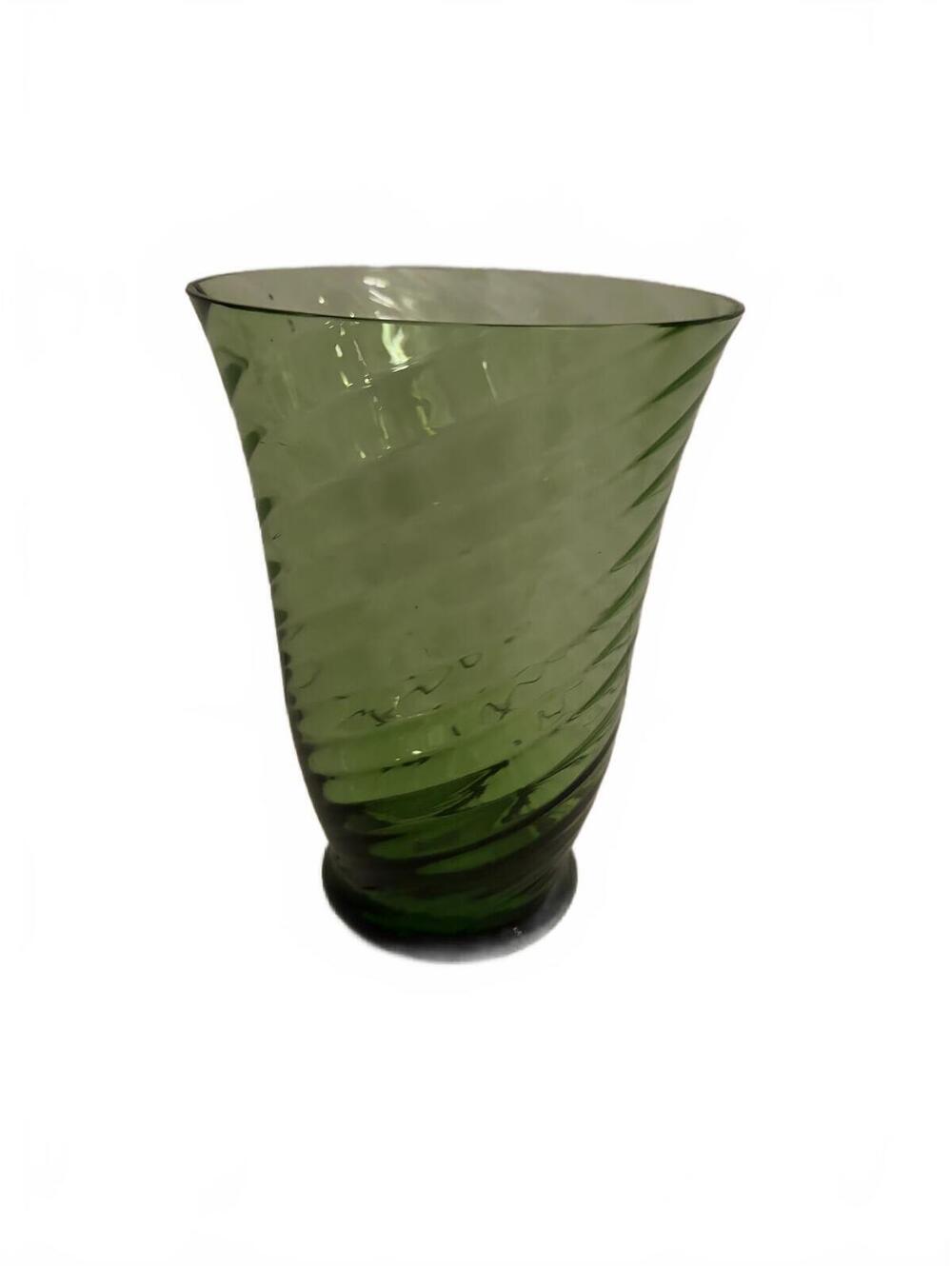 A vintage Italian green glass vase with a swirling pattern.